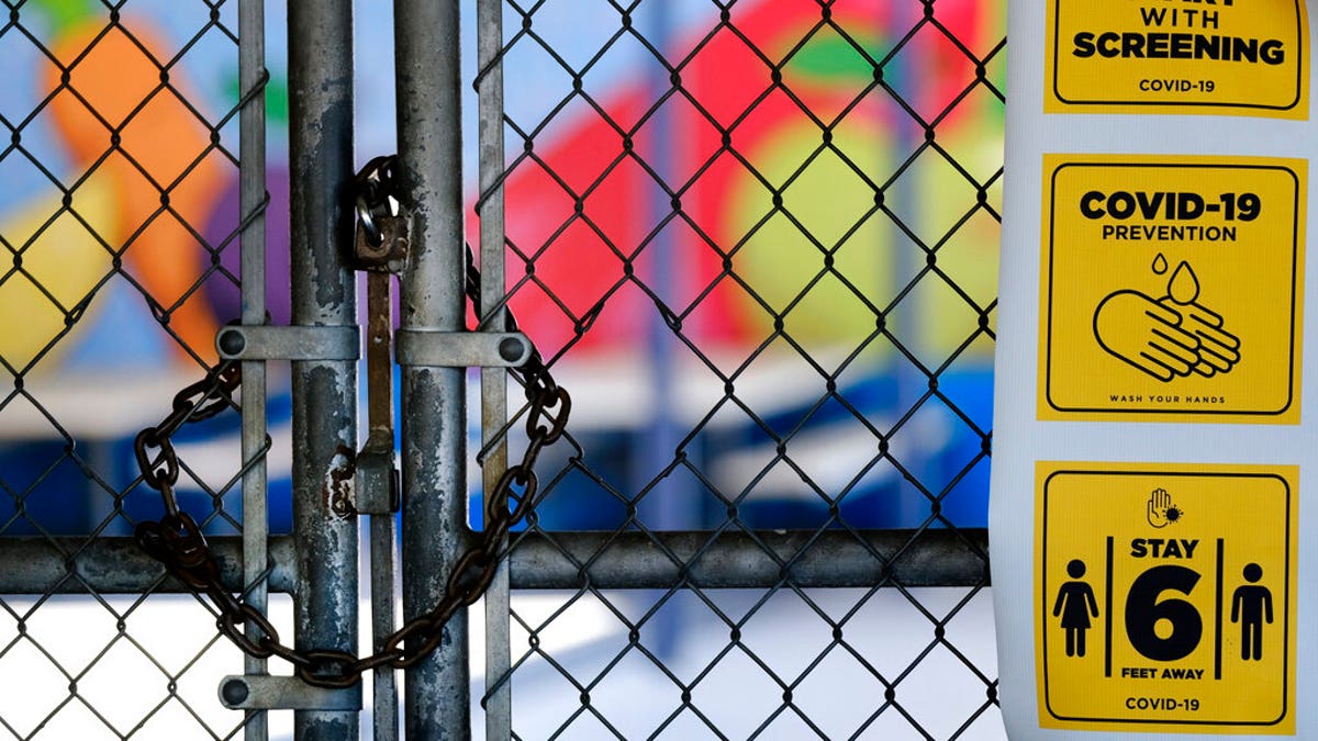 A gate is locked at the closed Ranchito Elementary School in the San Fernando Valley section of Los Angeles. 