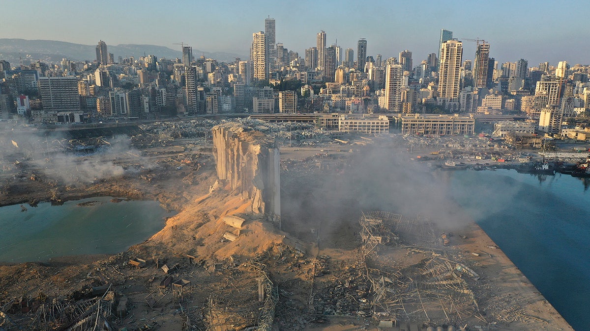 A drone picture shows the scene of an explosion at the seaport of Beirut, Lebanon, Wednesday, Aug. 5, 2020. (AP Photo/Hussein Malla)
