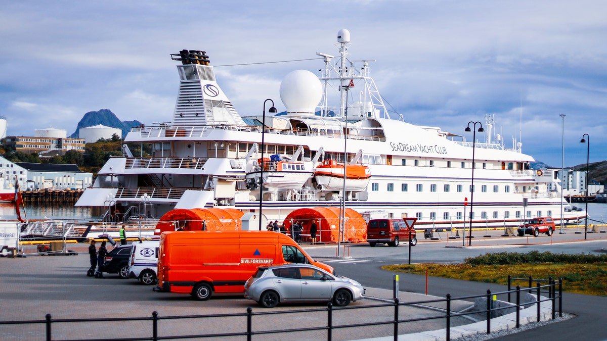 The cruise ship SeaDream 1 at the quay in Bodoe, Norway, Wednesday Aug. 5, 2020. The cruise ship with 123 passengers on board and a crew of 85 has docked in the Norwegian harbor of Bodoe but no one can disembark after a former passenger from Denmark tested positive for the coronavirus upon returning home. (Associated Press)