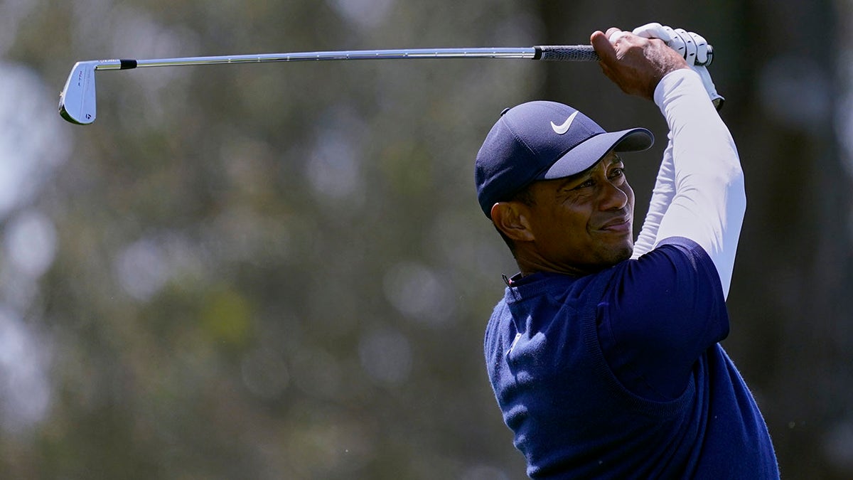 Tiger Woods watches his tee shot on the eighth hole during the third round of the PGA Championship golf tournament at TPC Harding Park Saturday, Aug. 8, 2020, in San Francisco. (Associated Press)