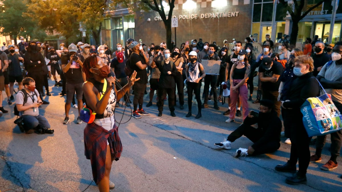 Ariel Atkins, seen here with the microphone, also blasted the response from Chicago Mayor Lori Lightfoot.