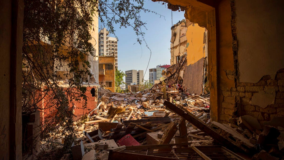 Destroyed buildings are seen from a room heavily damaged in a neighborhood near the site of last year's explosion that hit the seaport of Beirut in Lebanon, Aug. 12, 2020. (Associated Press)