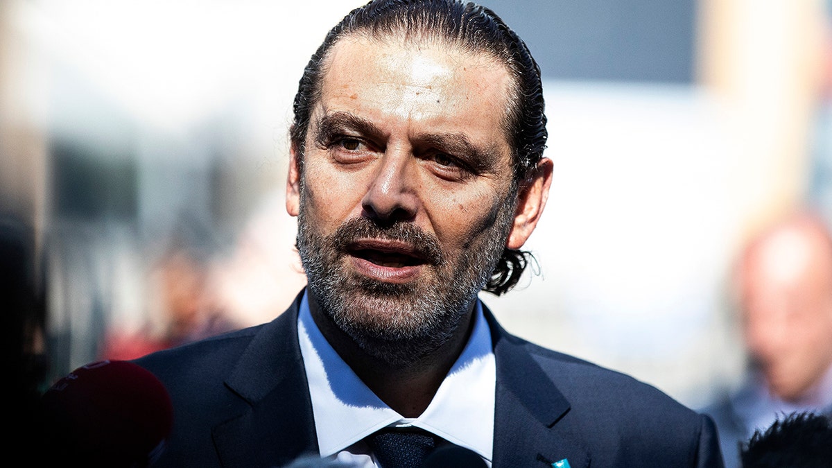 Former Lebanese Prime Minister Saad Hariri addresses the media after the United Nations-backed Lebanon Tribunal in Leidschendam, Netherlands Tuesday Aug. 18, 2020 handed down it's judgement in the case against four men being tried for the bombing that killed his father former Lebanon Prime Minister Rafik Hariri and 21 others. (AP Photo/Laurens van Putten)