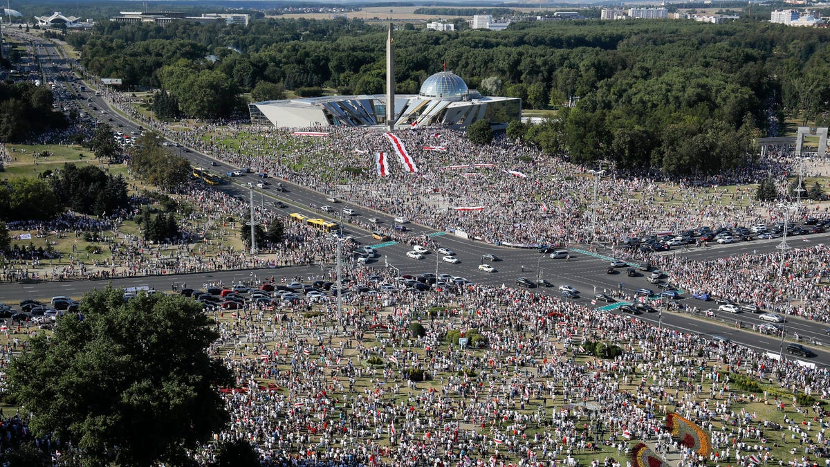 In this Sunday, Aug. 16, 2020 file photo Belarusian opposition supporters rally in the center of Minsk, Belarus. (AP Photo/Dmitri Lovetsky, File)