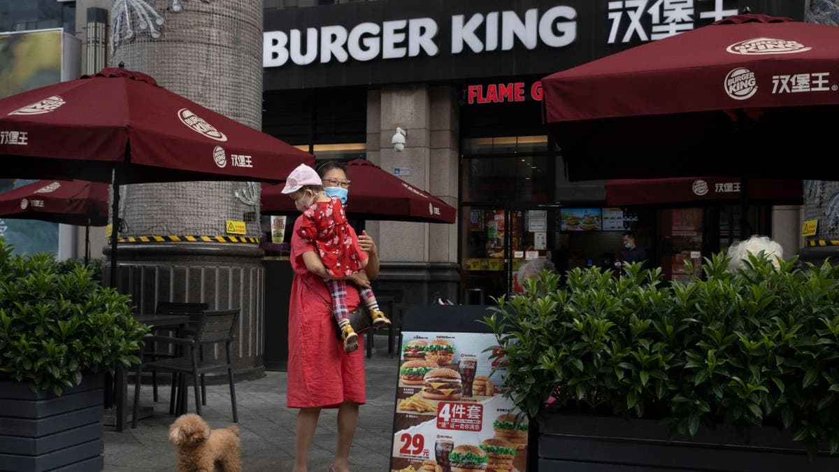 Burger King China apologized on the Chinese social media platform Weibo after the report and said it would cooperate with investigations into the franchisee’s restaurants. (AP Photo/Ng Han Guan)