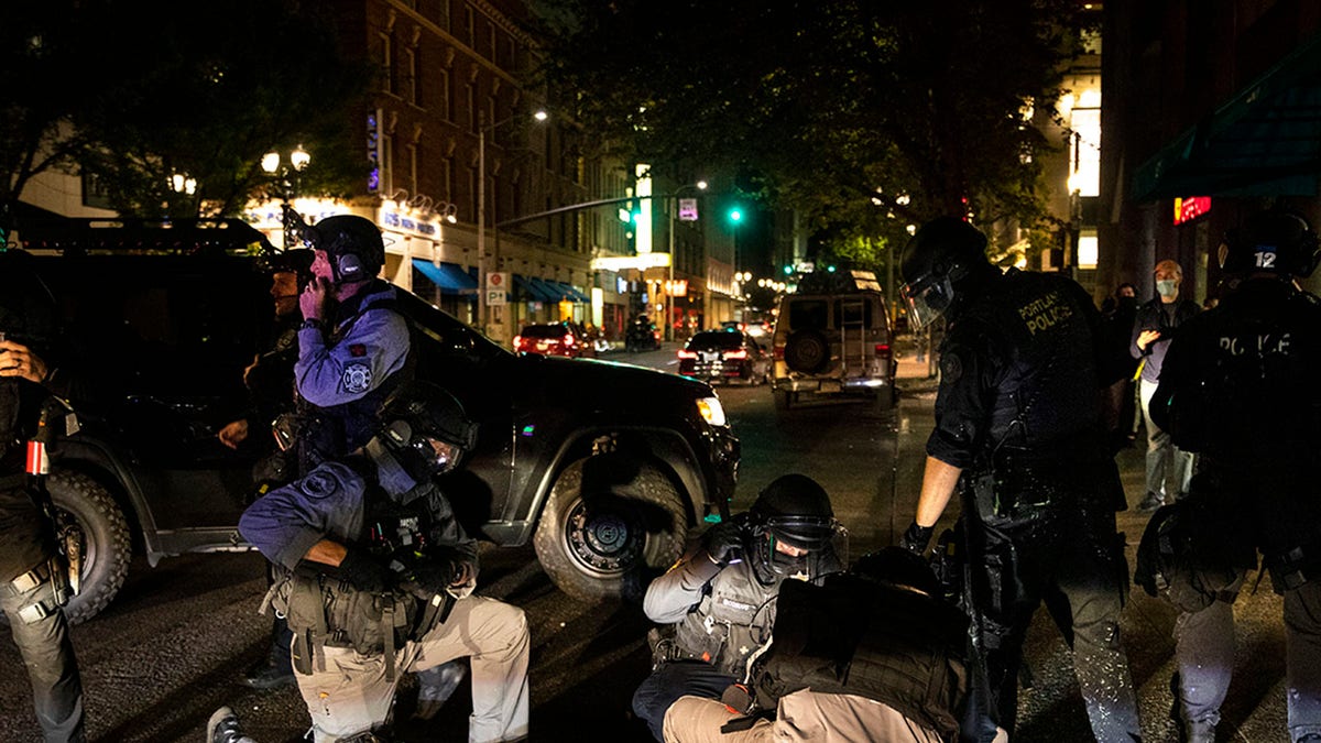 A man is being treated after being shot Saturday, Aug. 29, 2020, in Portland, Ore. (Associated Press)