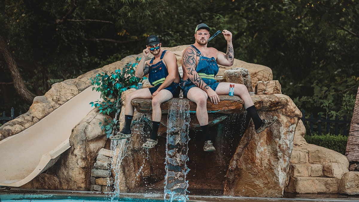 The jokesters recently went all-out for a hilarious “Dudeoir” poolside portrait session.