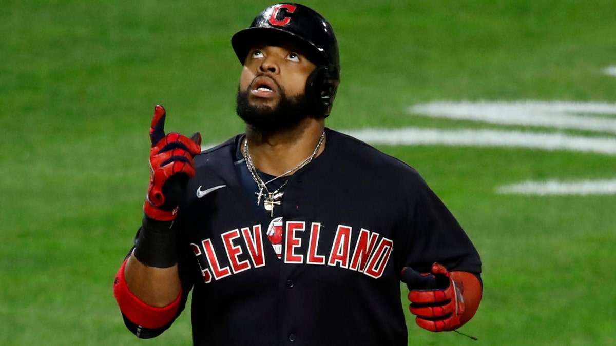Indians' Carlos Santana wears retired, controversial logo under jersey in  victory over Pirates
