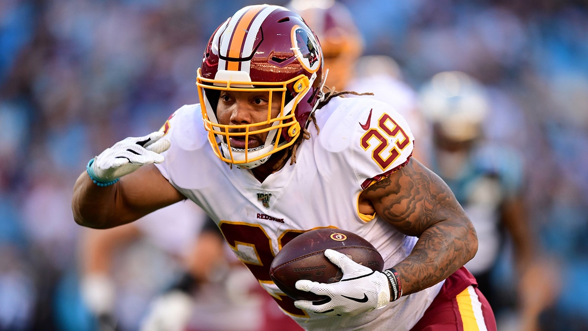 Derrius Guice was released by Washington after a domestic violence incident. (Photo by Jacob Kupferman/Getty Images)