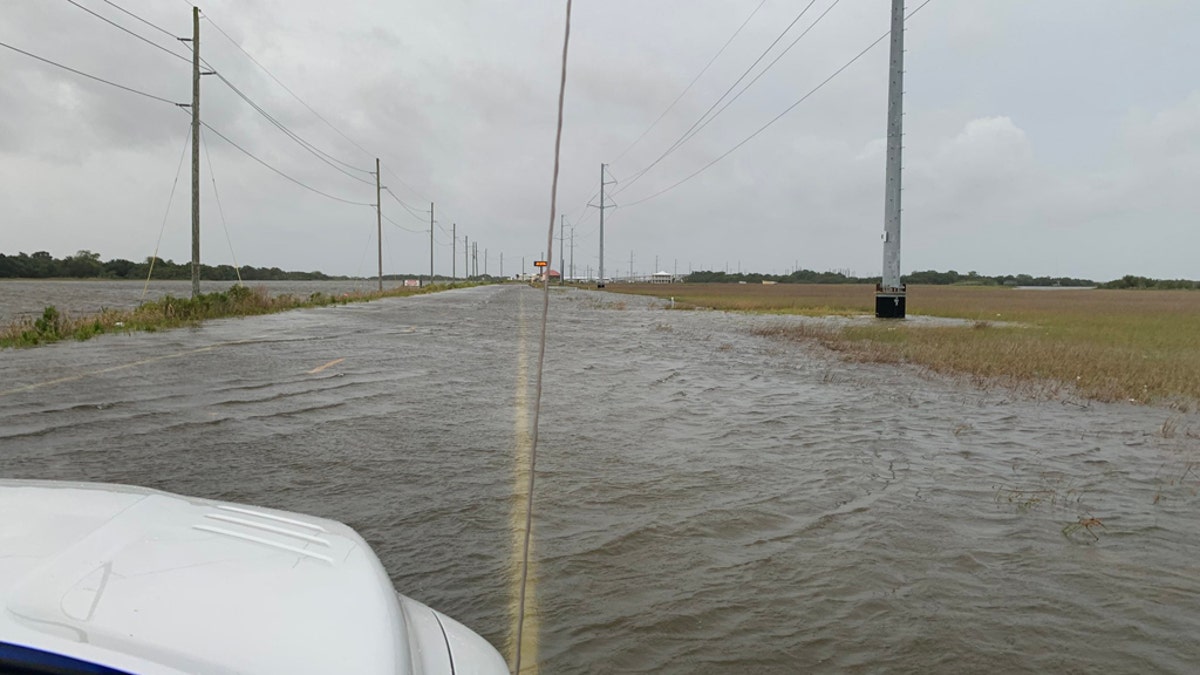 Rising waters as storm surge from Hurricane Laura nears the Gulf Coast can be seen on Wednesday, Aug. 26, 2020.