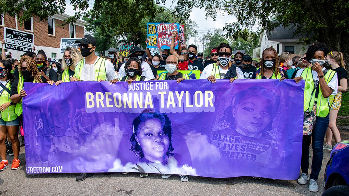 Protesters participate in the Good Trouble Tuesday march for Breonna Taylor, on Tuesday, Aug. 25, 2020, in Louisville, Ky. (Amy Harris/Invision/AP)
