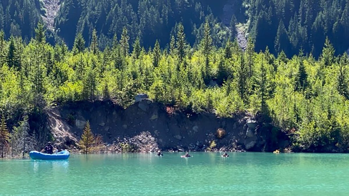 The Pierce County Sheriff’s Dive Team searches an unnamed lake at Mount Rainier.