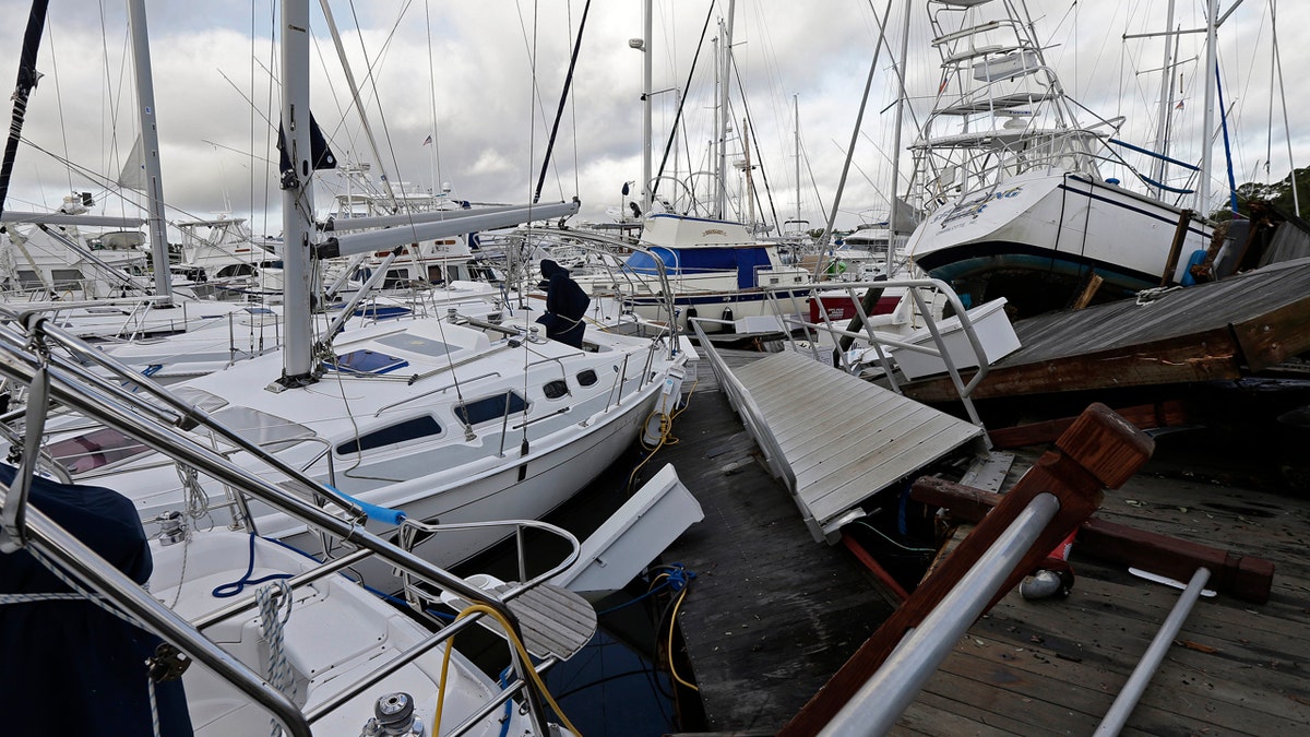 Boats are piled on each other in the marina following the effects of Hurricane Isaias in Southport, N.C., Tuesday, Aug. 4, 2020.