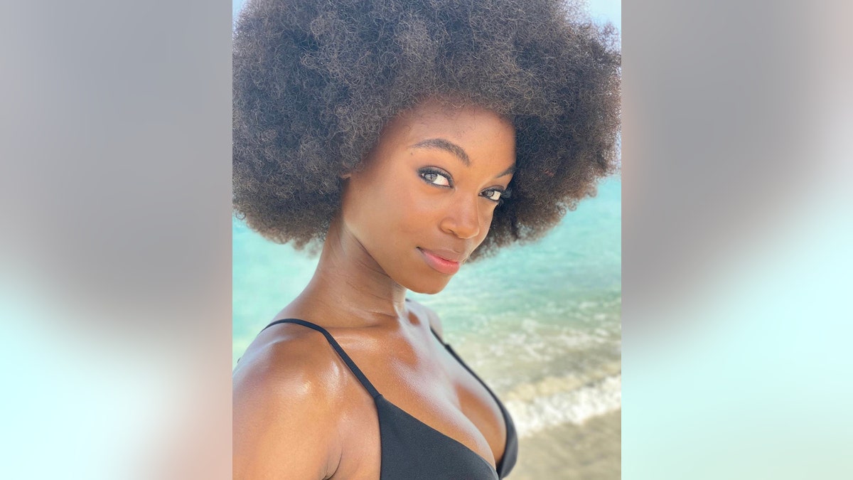 Model Tanaye White poses for the 2021 Sports Illustrated swimsuit