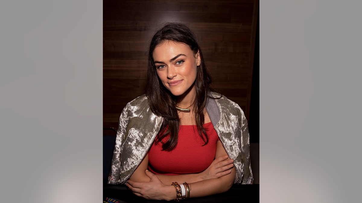 SI Swimsuit model Myla Dalbesio signs autographs during the VIBES by Sports Illustrated Swimsuit 2017 launch festival on February 17, 2017, in Houston, Texas.
