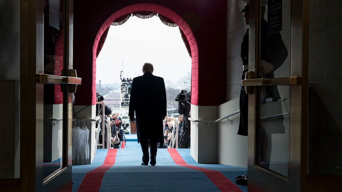 President-elect Donald Trump walks to his seat at the swearing-in ceremony at the U.S. Capitol in Washington, D.C., on Friday, January 20, 2017. (Official White House Photo by Shealah Craighead)