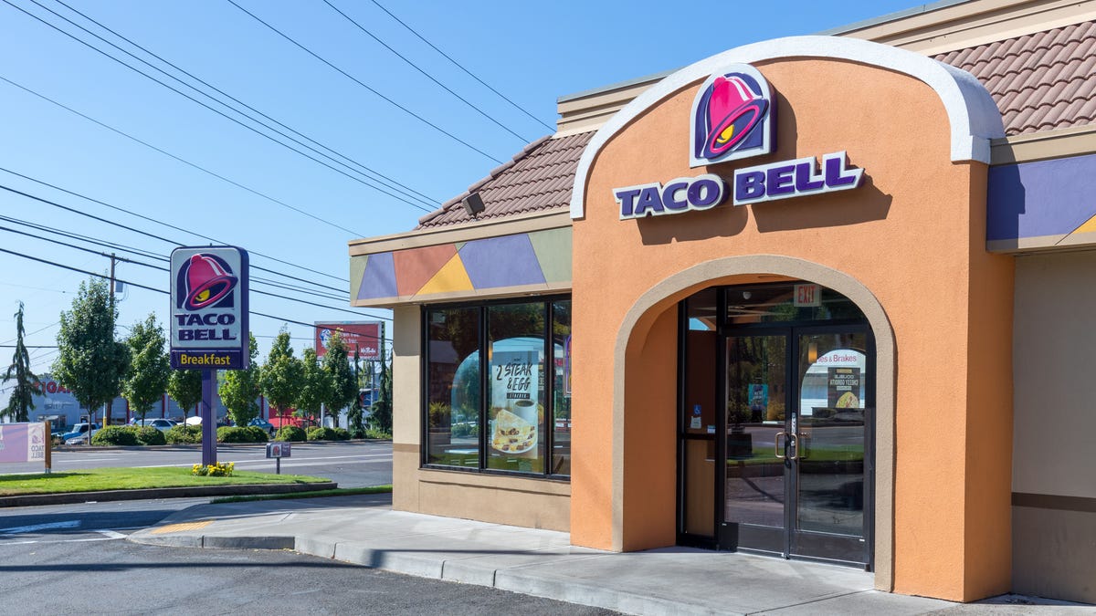 Exterior of Taco Bell fast-food restaurant with sign and logo