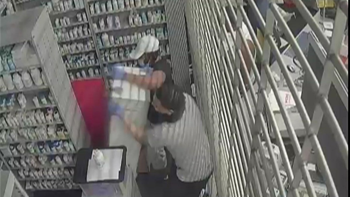 The thieves allegedly tore a safe off the wall of a CVS Pharmacy and carried it out of the store. (FBI)