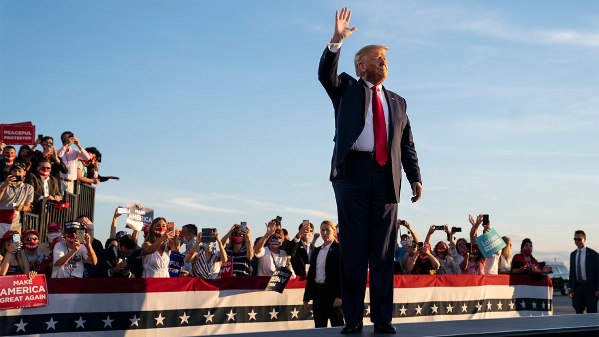 President Donald Trump arrives to speak to a campaign rally, Aug. 28, in Londonderry, N.H. (AP Photo/Evan Vucci)