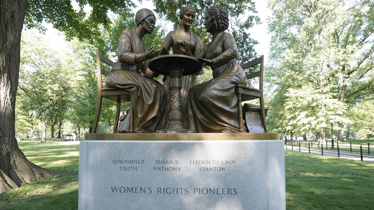 FILE -- The unveiling of the statue of women's rights pioneers Susan B. Anthony, Elizabeth Cady Stanton and Sojourner Truth is seen in Central Park in New York on August 26, 2020, marking the park's first statue of real-life women. (Photo by TIMOTHY A. CLARY/AFP via Getty Images)