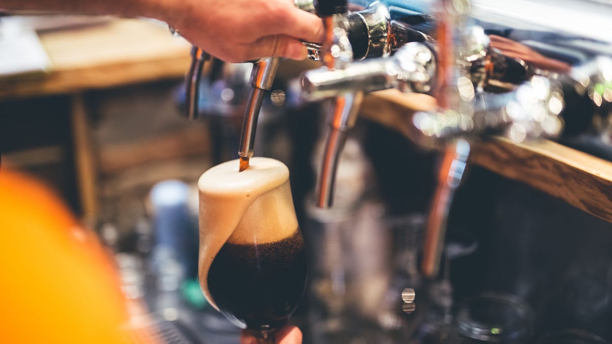 Pouring ale from a beer tap