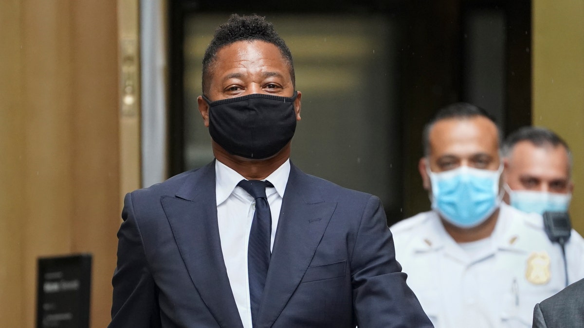 Cuba Gooding Jr. leaves court after a hearing in Gooding's sexual misconduct case, Thursday, Aug. 13, 2020, in New York. A judge ordered the courtroom outfitted with Plexiglas and other measures to prevent the spread of the coronavirus, which has delayed the trial indefinitely. (AP Photo/John Minchillo)