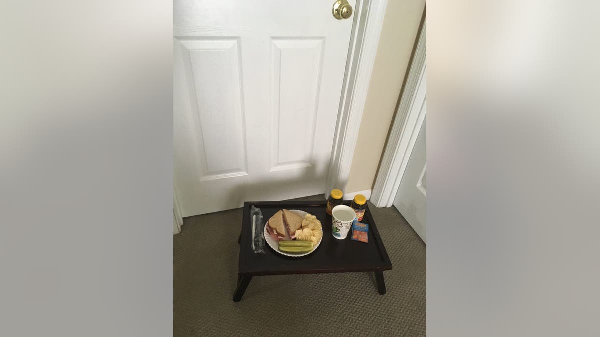 Family dinners at the table became trays left in front of closed door.