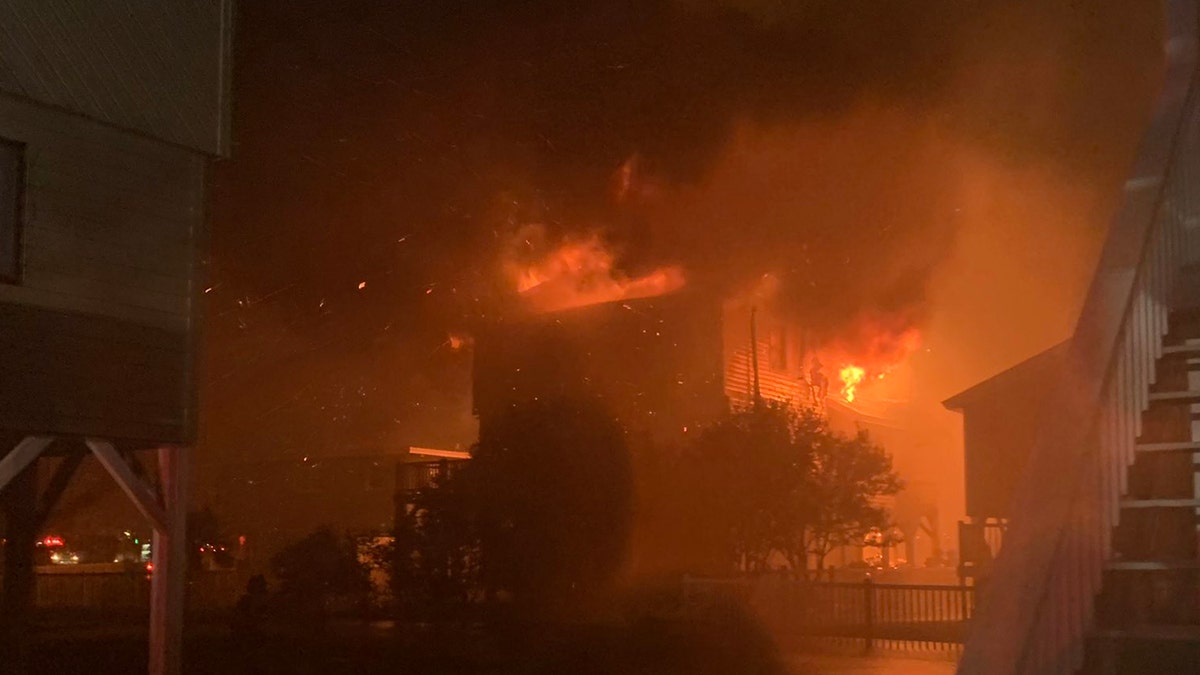 In this photo provided by the Horry County Frie Rescue, multiple structure fires burn Aug. 4. 2020, in Ocean Isle Beach, N.C. Hurricane Isaias sparked five home fires in town, Ocean Isle Beach Mayor Debbie Smith told WECT-TV.