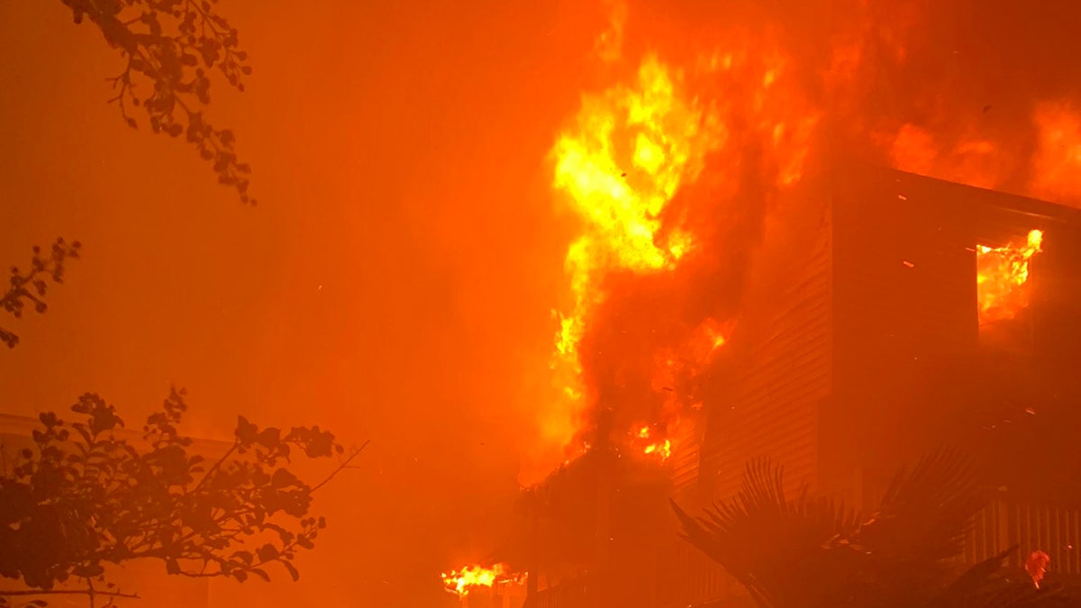 In this photo provided by the Horry County Frie Rescue, multiple structure fires burn Aug. 4. 2020, in Ocean Isle Beach, N.C. Hurricane Isaias sparked five home fires in town, Ocean Isle Beach Mayor Debbie Smith told WECT-TV.