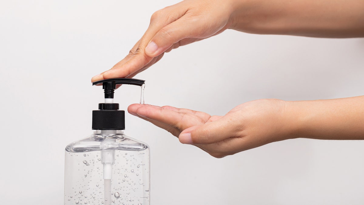 The Centers for Disease Control and Prevention recommends using hand sanitizer that contains at least 60% alcohol.