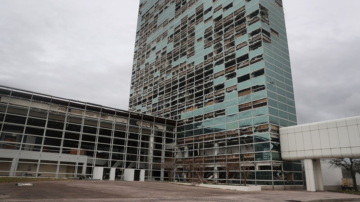 A building with its windows blown out is seen in the downtown area after Hurricane Laura passed through on August 27, 2020 in Lake Charles, Louisiana.