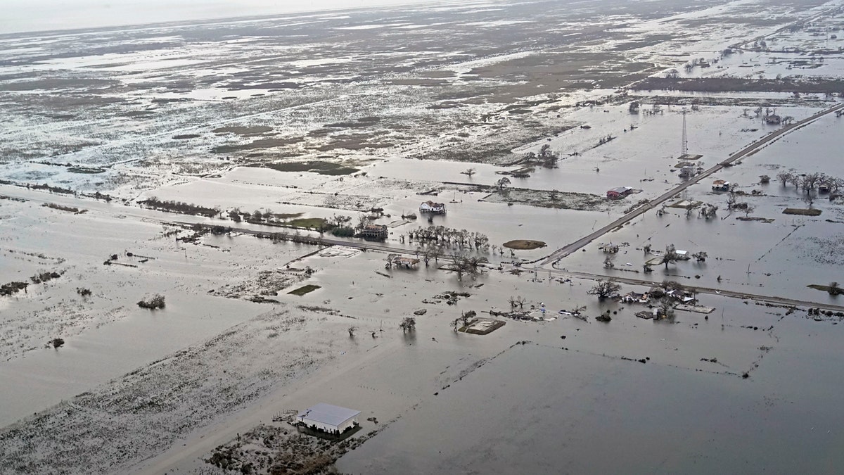 State Highway 27 leading to Cameron, La. is seen in Creole, La., Friday, Aug. 28, 2020, as the storm surge recedes in the aftermath of Hurricane Laura.