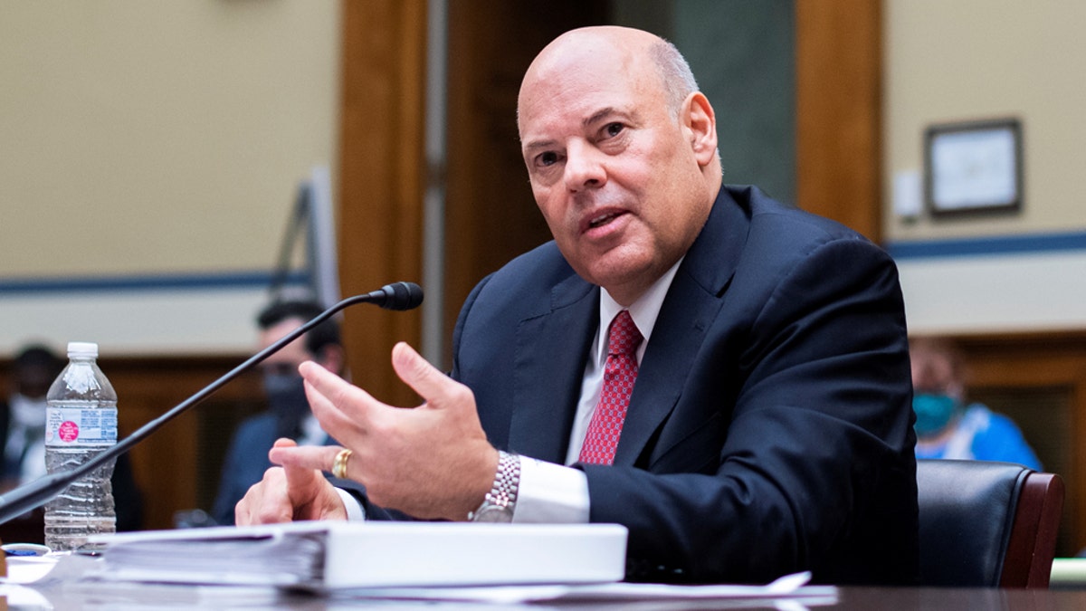 Postmaster General Louis DeJoy testifies before a House Oversight and Reform Committee hearing on slowdowns at the Postal Service ahead of the November elections on Capitol Hill in Washington, Aug. 24, 2020. (Tom Williams/Pool via REUTERS