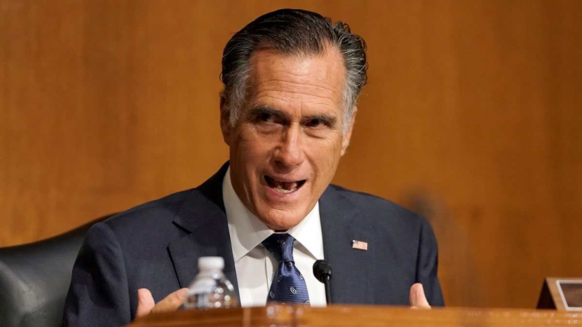 Sen. Mitt Romney, R-Utah, asks a question to Secretary of State Mike Pompeo during a Senate Foreign Relations committee hearing on the State Department's 2021 budget on Capitol Hill Thursday, July 30, 2020, in Washington. (Greg Nash/Pool via AP)