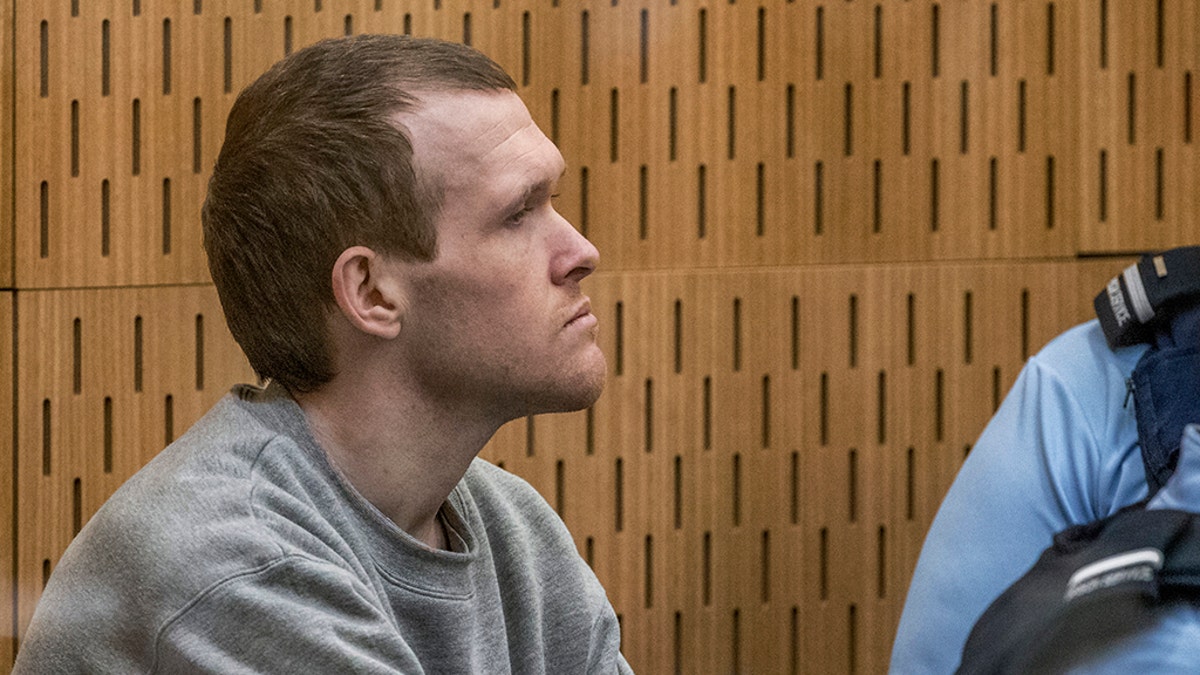 Australian Brenton Harrison Tarrant, 29, sits in the dock on day three at the Christchurch High Court for sentencing after pleading guilty to 51 counts of murder, 40 counts of attempted murder and one count of terrorism in Christchurch, New Zealand, Wednesday, Aug. 26, 2020. (John Kirk-Anderson/Pool Photo via AP)