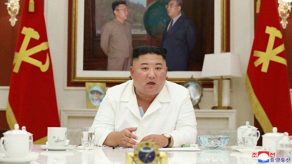 In this photo provided by the North Korean government, North Korean leader Kim Jong Un, presides over an executive policy council meeting on Aug. 5, 2020.