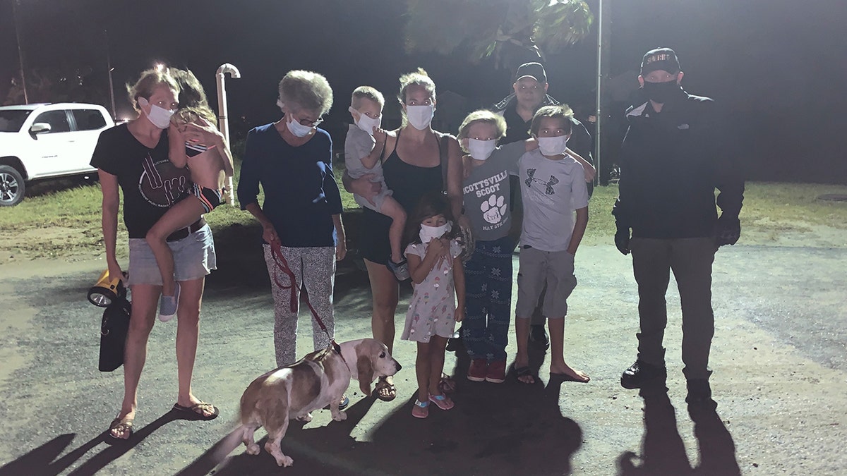 A group of nine people and their dog were rescued overnight from Oak Island as the hurricane roared ashore.