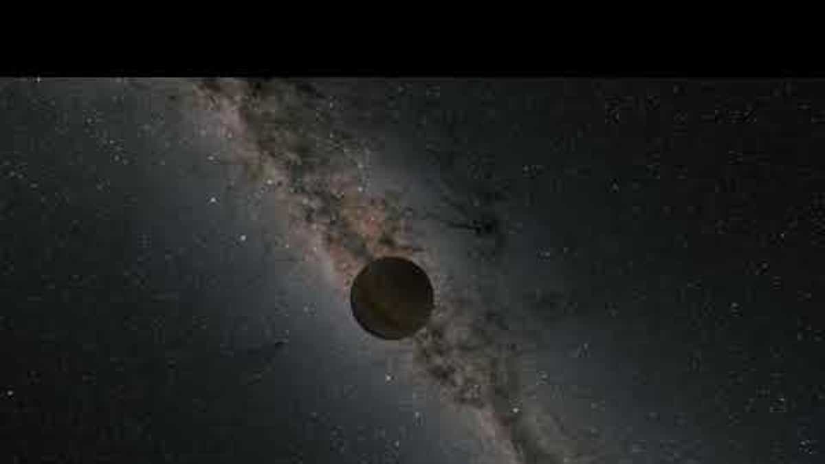 This illustration shows a rogue planet drifting through the galaxy alone. (NASA/JPL-Caltech/R. Hurt [Caltech-IPAC])