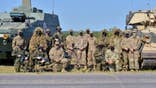 Soldiers are required to wear a mask when they are around anyone that has not recently tested negative for COVID-19.