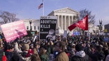 Pro-life demonstrators hold signs while marching past the U.S. Supreme Court during the 46th annual March for Life in Washington, D.C., U.S., on Jan. 18, 2019. People from around the nation gathered in Washington D.C. today for the annual rally against abortion, which included a video message from President Trump and an address by Vice President Mike Pence. Photographer: Zach Gibson/Bloomberg via Getty Images