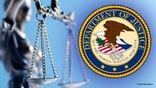 A close up and a low angle view of a statue of lady justice as it sits in front of a blue background The image is photographed with a very shallow depth of field with the focus being on the justice scale.