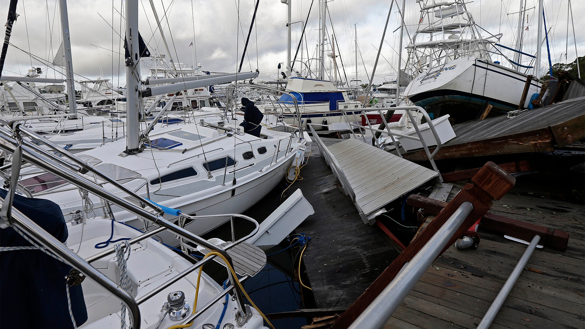 Boats are piled on each other in the marina following the effects of Hurricane Isaias in Southport, N.C., Tuesday, Aug. 4, 2020.