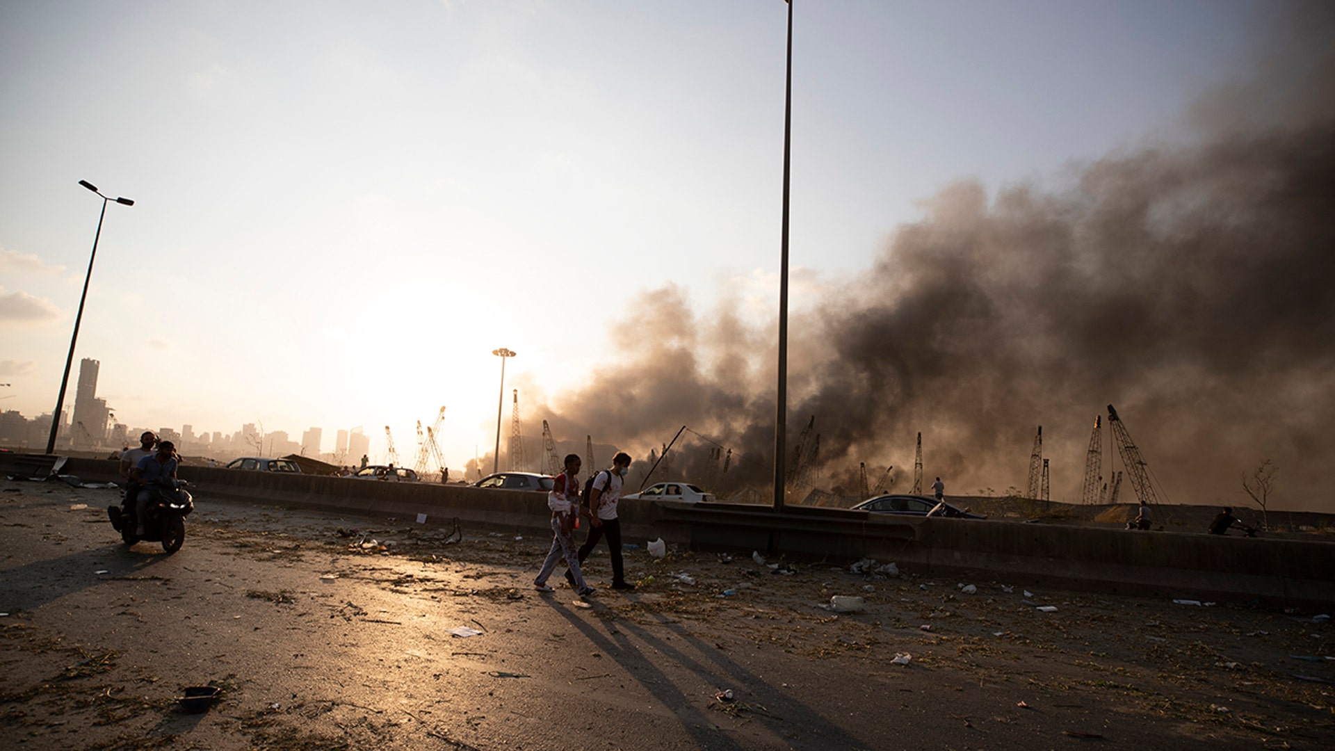A smoke from a massive explosion is seen in in Beirut, Lebanon Tuesday.