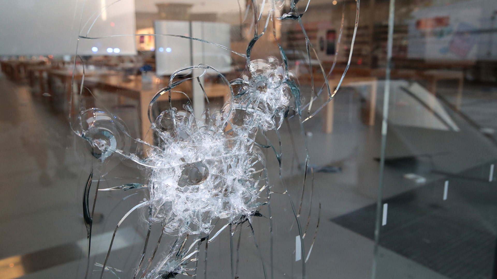 Officials told the Chicago Tribune that one gun was seized in connection with the looting. A rock also reportedly was thrown at a police car while anti-cop graffiti was spotted in two locations.