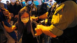 Hong Kong police issue arrest warrant for US citizen amid crackdown on pro-democracy activists