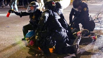 Police brace for more protests in Portland after another night of clashes