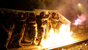 Beirut cop killed in anti-government clashes as Macron calls on world to help