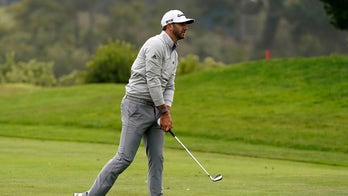 Dustin Johnson emerges from a pack to lead PGA Championship