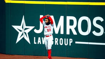Angels rookie Jo Adell has nightmare moment as fly ball pops out of his glove and over right field wall