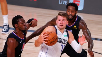 Luka Doncic's debut good enough for history, but not for a win